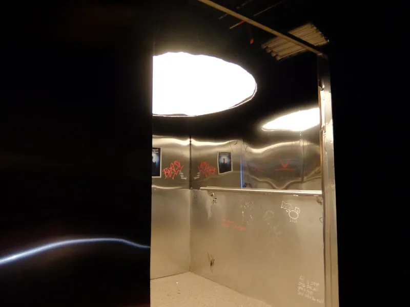 The lit set · camera through the mirror · cast inside