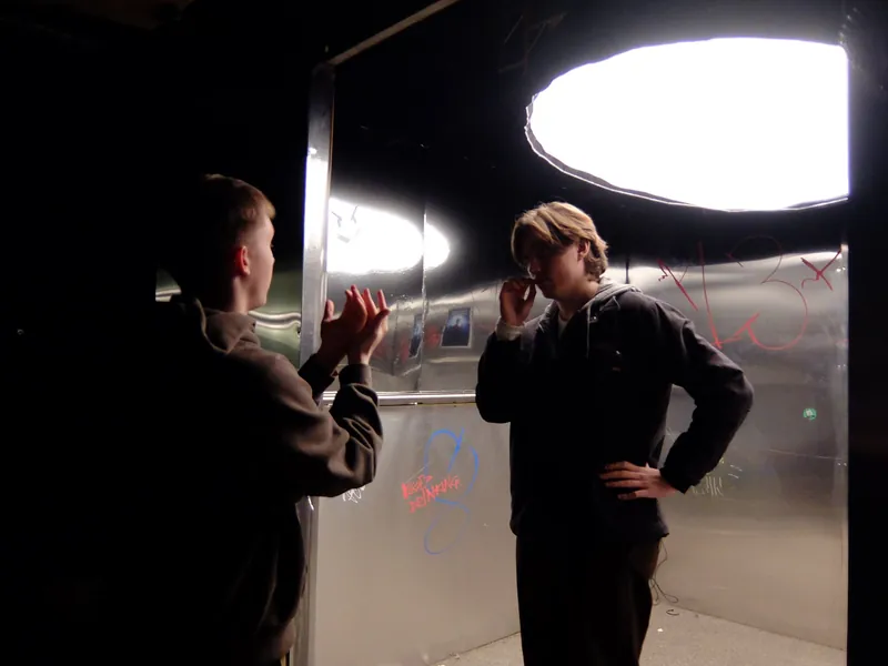 The lit set · camera through the mirror · cast inside