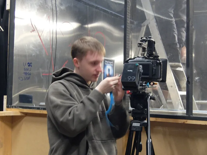 Elevator plans · set walls · two-way mirror · camera shooting in